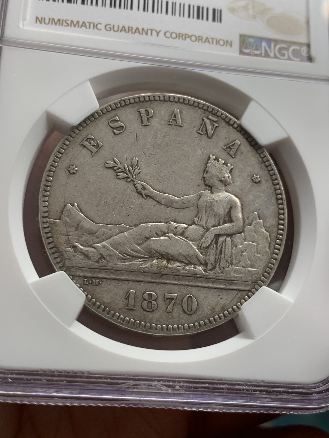 《竞宝斋》第39，40场-本周日，周一2场连拍（全场顺丰包邮） NGC-XF40 西班牙 1870年 坐人拿花 5比塞塔双柱 大银币 好品原味