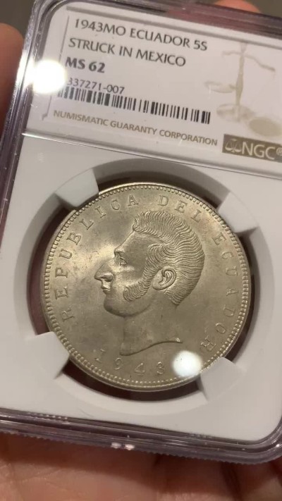 《竞宝斋》第39，40场-本周日，周一2场连拍（全场顺丰包邮） NGC-MS62 厄瓜多尔 1943年 5苏克雷 原光大银币 这发型得花掉多少摩丝呢？