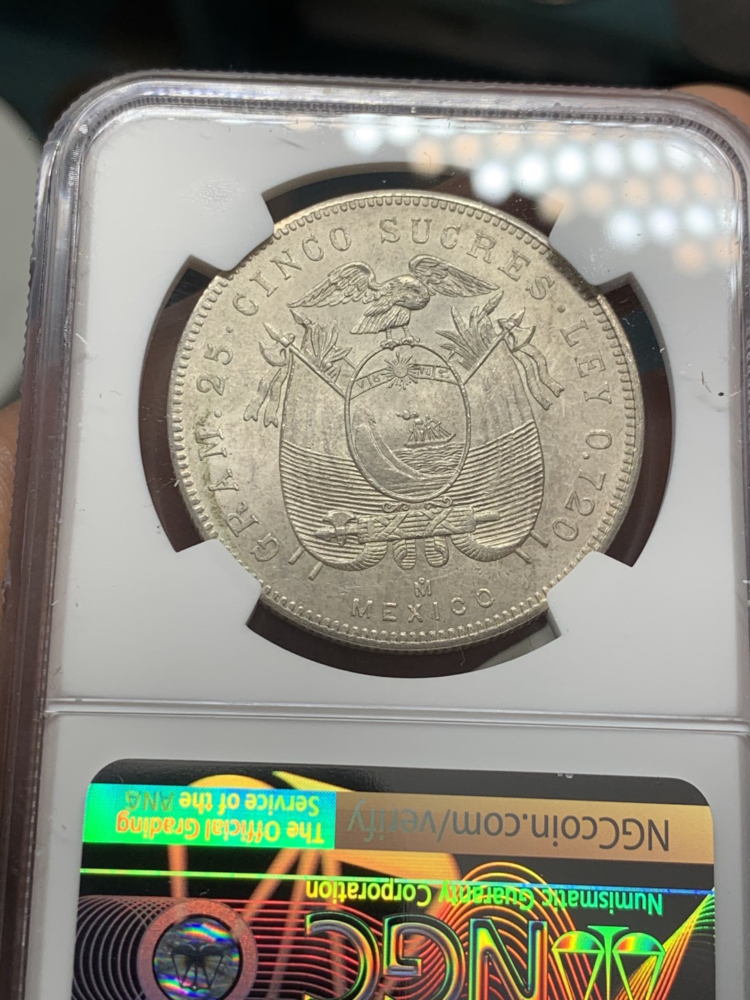 《竞宝斋》第39，40场-本周日，周一2场连拍（全场顺丰包邮） NGC-MS62 厄瓜多尔 1943年 5苏克雷 原光大银币 这发型得花掉多少摩丝呢？