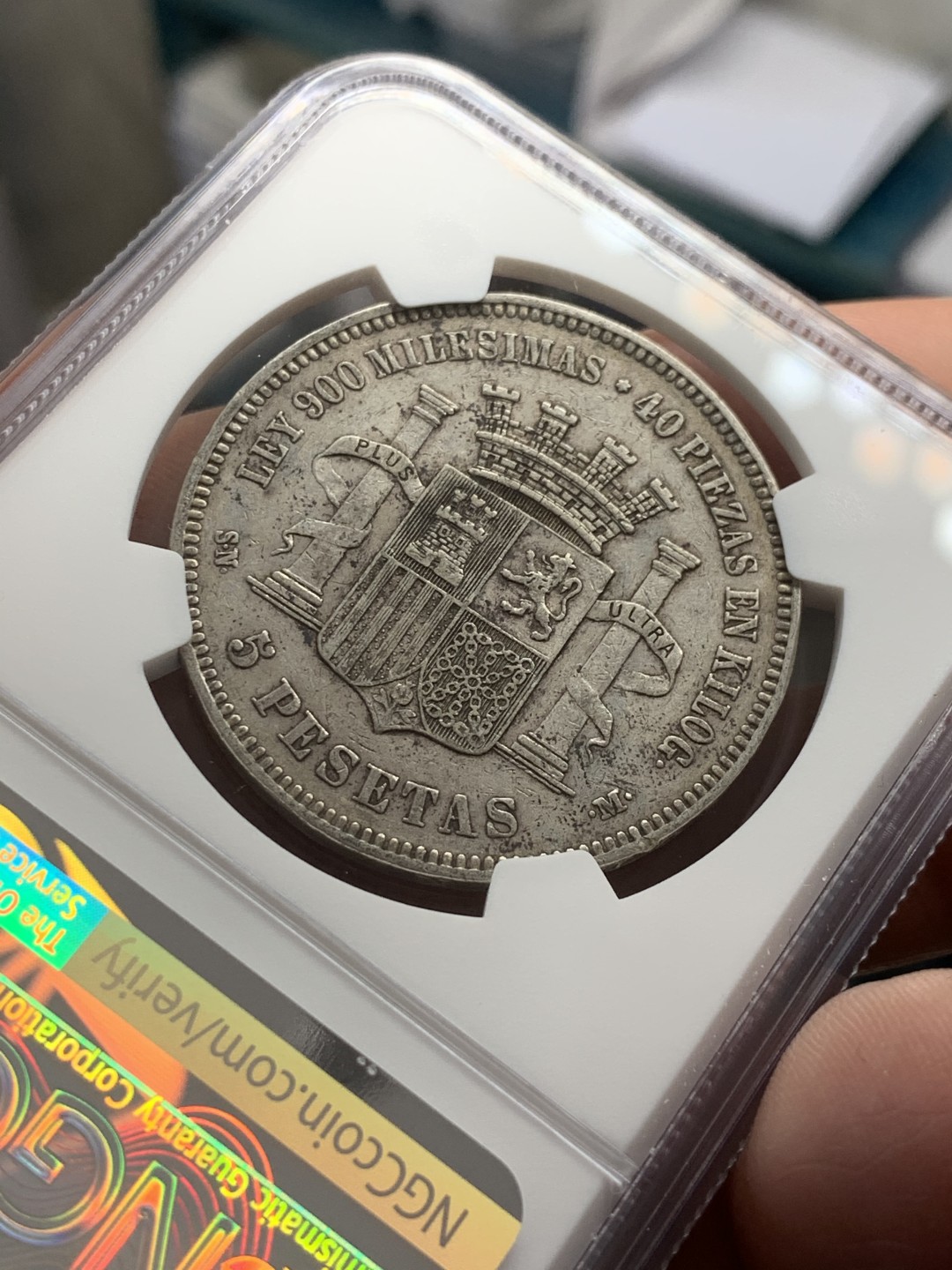 《竞宝斋》第39，40场-本周日，周一2场连拍（全场顺丰包邮） NGC-XF40 西班牙 1870年 坐人拿花 5比塞塔双柱 大银币 好品原味