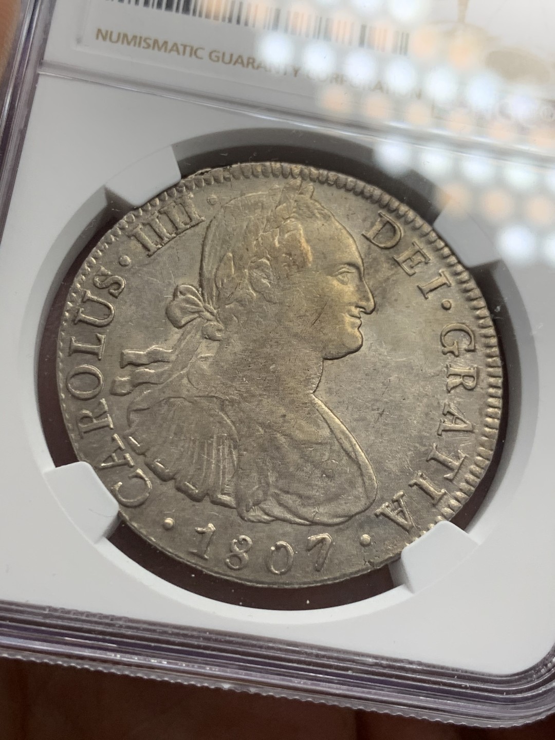 《竞宝斋》第39，40场-本周日，周一2场连拍（全场顺丰包邮） NGC-AU53 墨西哥 1807年 8 里亚尔  人像双柱卡洛斯四世  银币      原味