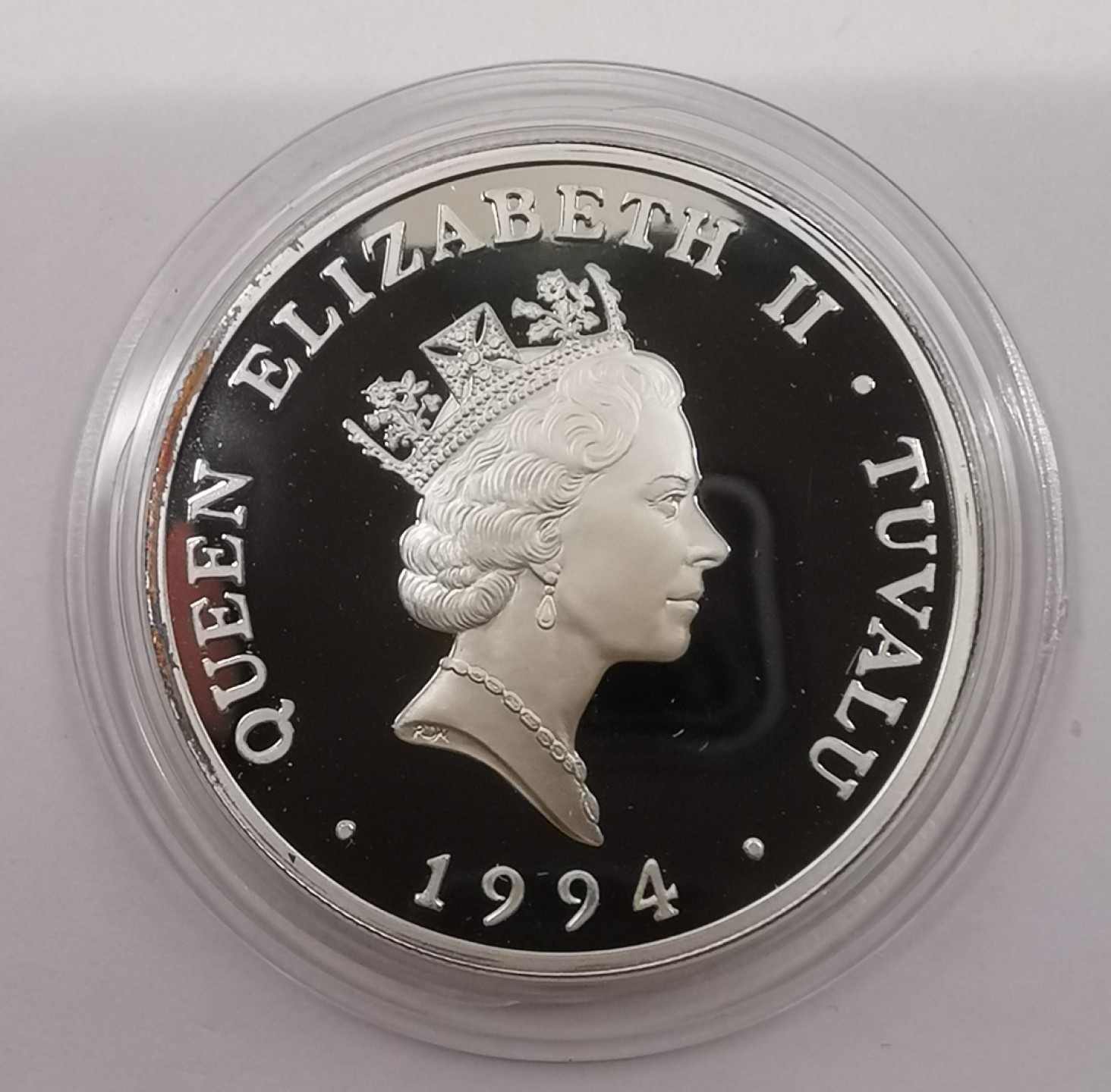 乐游外币首场自动拍卖—各国动物及世界杯足球币 1994图瓦卢20精制银币世界币足球赛边缘有氧化