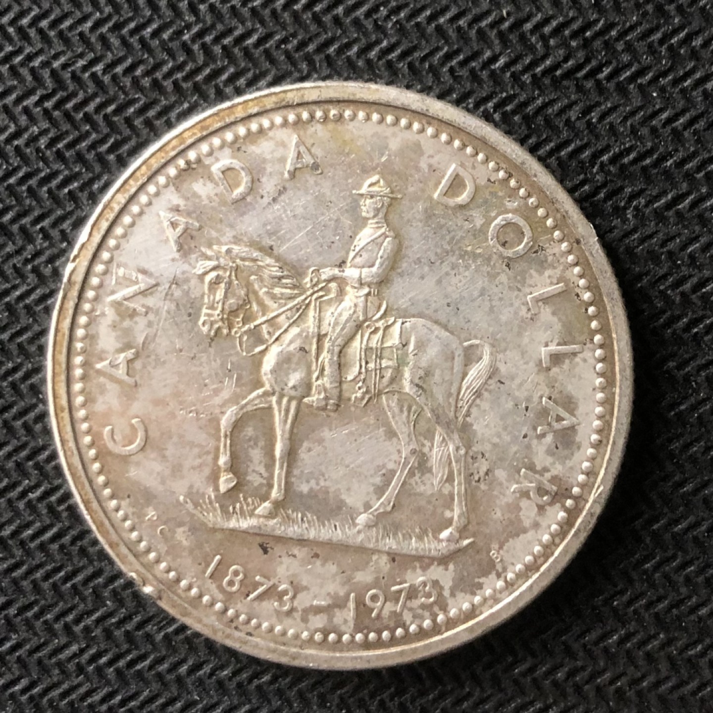 【保诚微拍】【全场包邮】第22期 $ 银币专场 $ Silver Coins  加拿大 伊丽莎白二世 1973年 皇家骑警成立一百年纪念  一元 银币  （23.3克 0.8银）