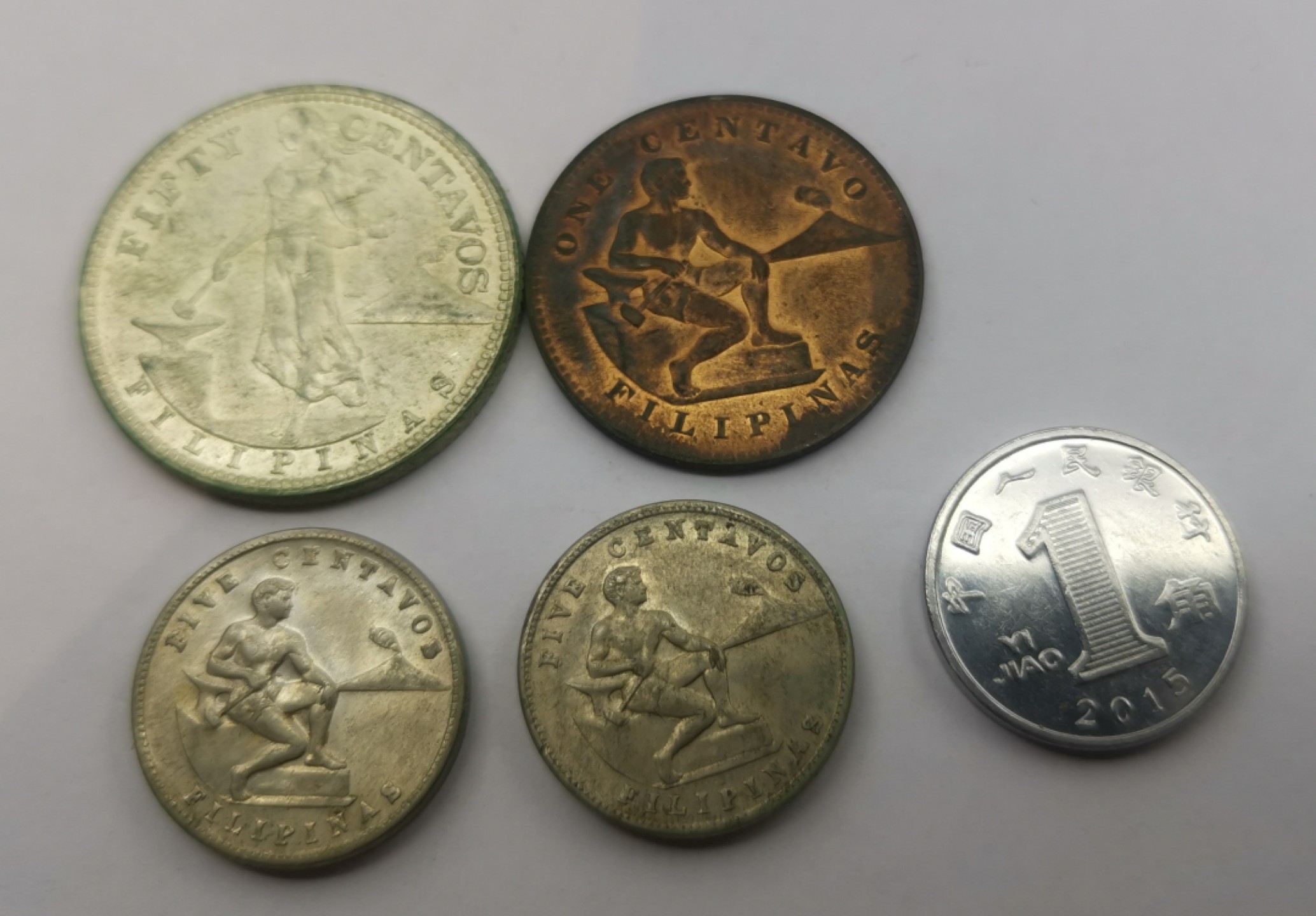 乐游外币-来自国外老藏家的散币 1944菲律宾4枚UNC有氧化-包括一枚银币