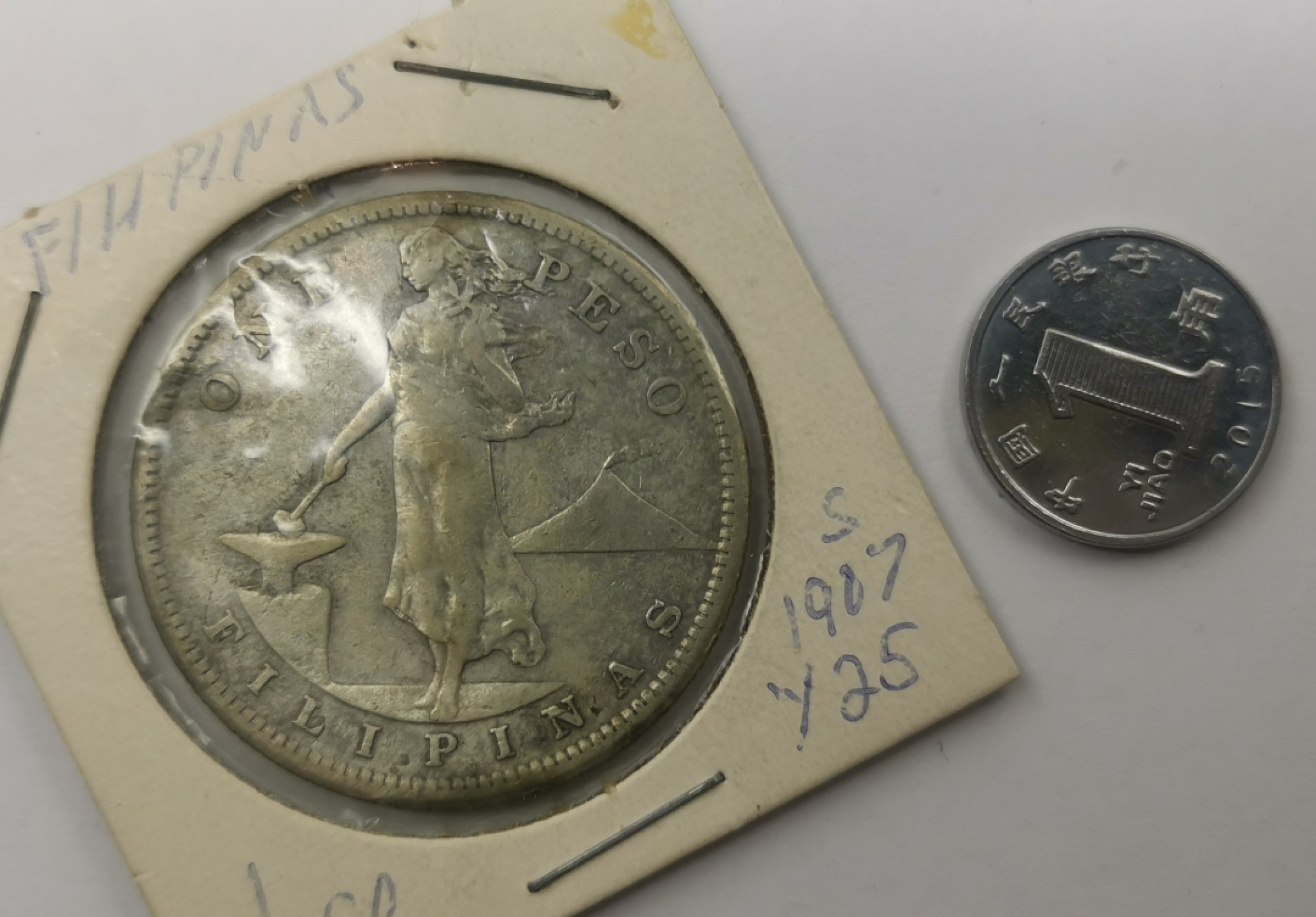 乐游外币-来自国外老藏家的散币 1907菲律宾1比索银币打铁女神