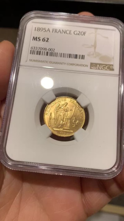 《竞宝斋》第43场-本周日，周一2场连拍（全场顺丰包邮） NGC-MS62 法国 1895年 天使 20法郎 金币 转光好品 这品种最近暴涨