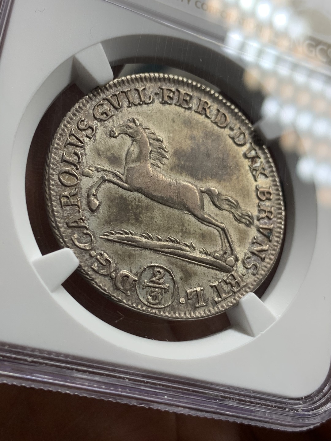 《竞宝斋》第43场-本周日，周一2场连拍（全场顺丰包邮） 亚军 NGC-AU55 德国布伦瑞克 1800MC 年 宝马奔腾 2/3泰勒 大银币 非常稀少的品种