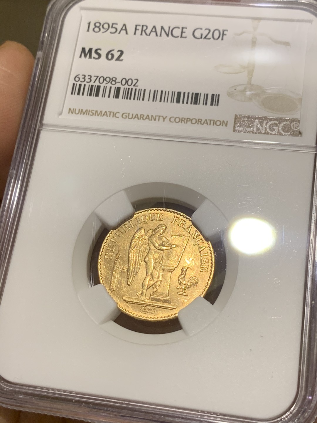 《竞宝斋》第43场-本周日，周一2场连拍（全场顺丰包邮） NGC-MS62 法国 1895年 天使 20法郎 金币 转光好品 这品种最近暴涨