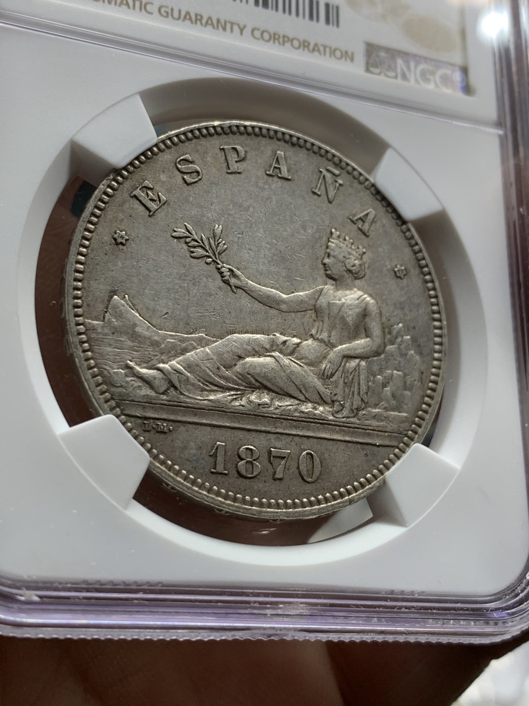 《竞宝斋》第43场-本周日，周一2场连拍（全场顺丰包邮） NGC-AU55 西班牙 1870年 坐人拿花 5比塞塔 双柱大银币 这分数已经非常非常高了