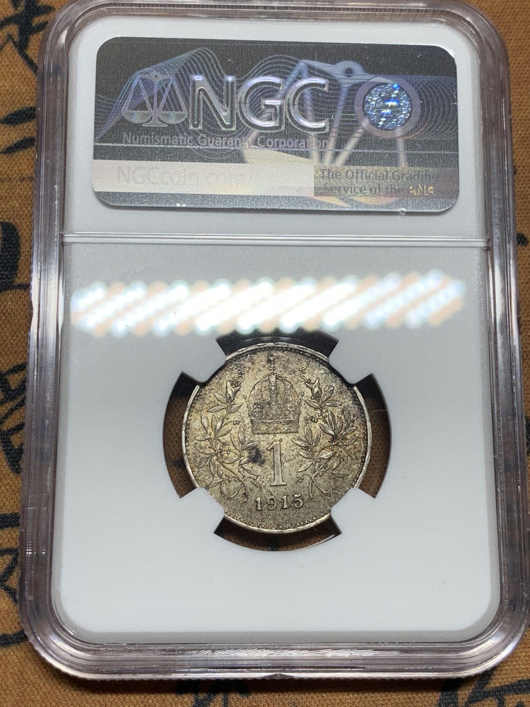 《竞宝斋》第43场-本周日，周一2场连拍（全场顺丰包邮） NGC-MS61 奥地利 1915难 佛朗茨一世 1克朗 银币 五彩包浆 很漂亮