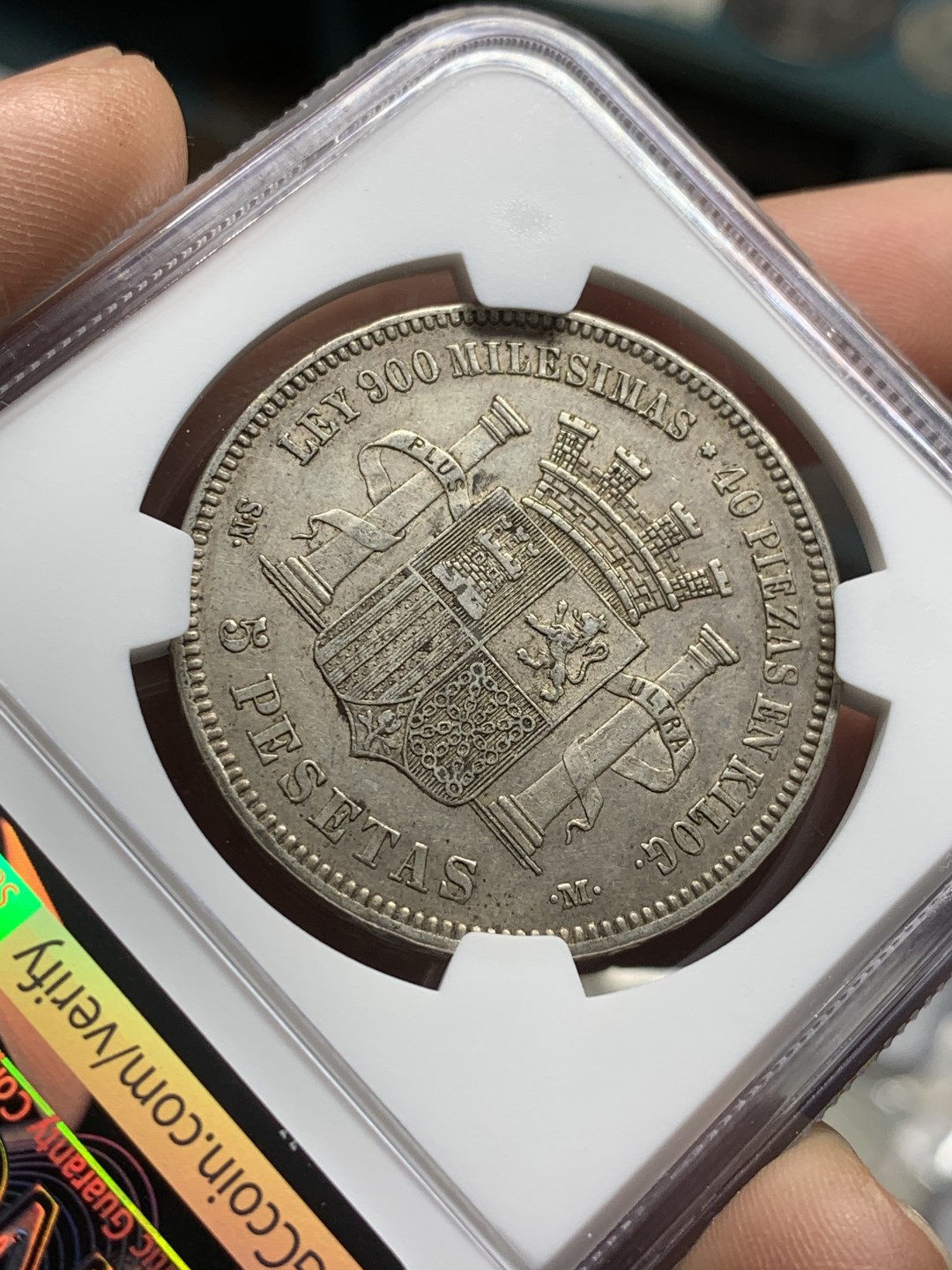 《竞宝斋》第43场-本周日，周一2场连拍（全场顺丰包邮） NGC-AU55 西班牙 1870年 坐人拿花 5比塞塔 双柱大银币 这分数已经非常非常高了