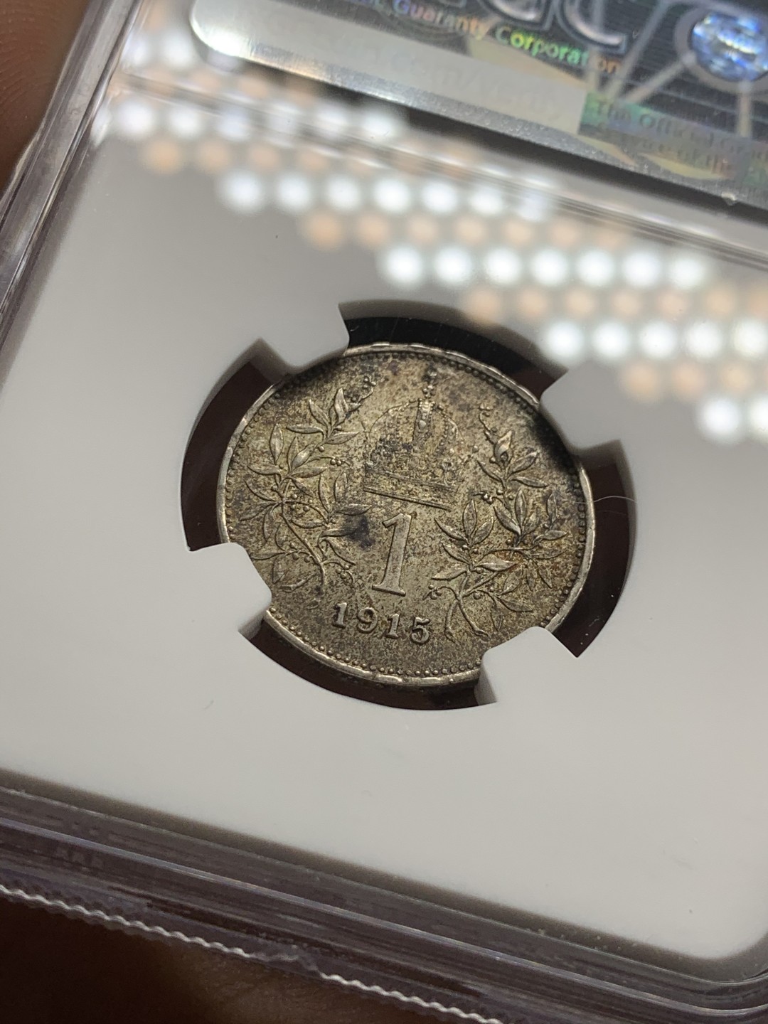 《竞宝斋》第43场-本周日，周一2场连拍（全场顺丰包邮） NGC-MS61 奥地利 1915难 佛朗茨一世 1克朗 银币 五彩包浆 很漂亮