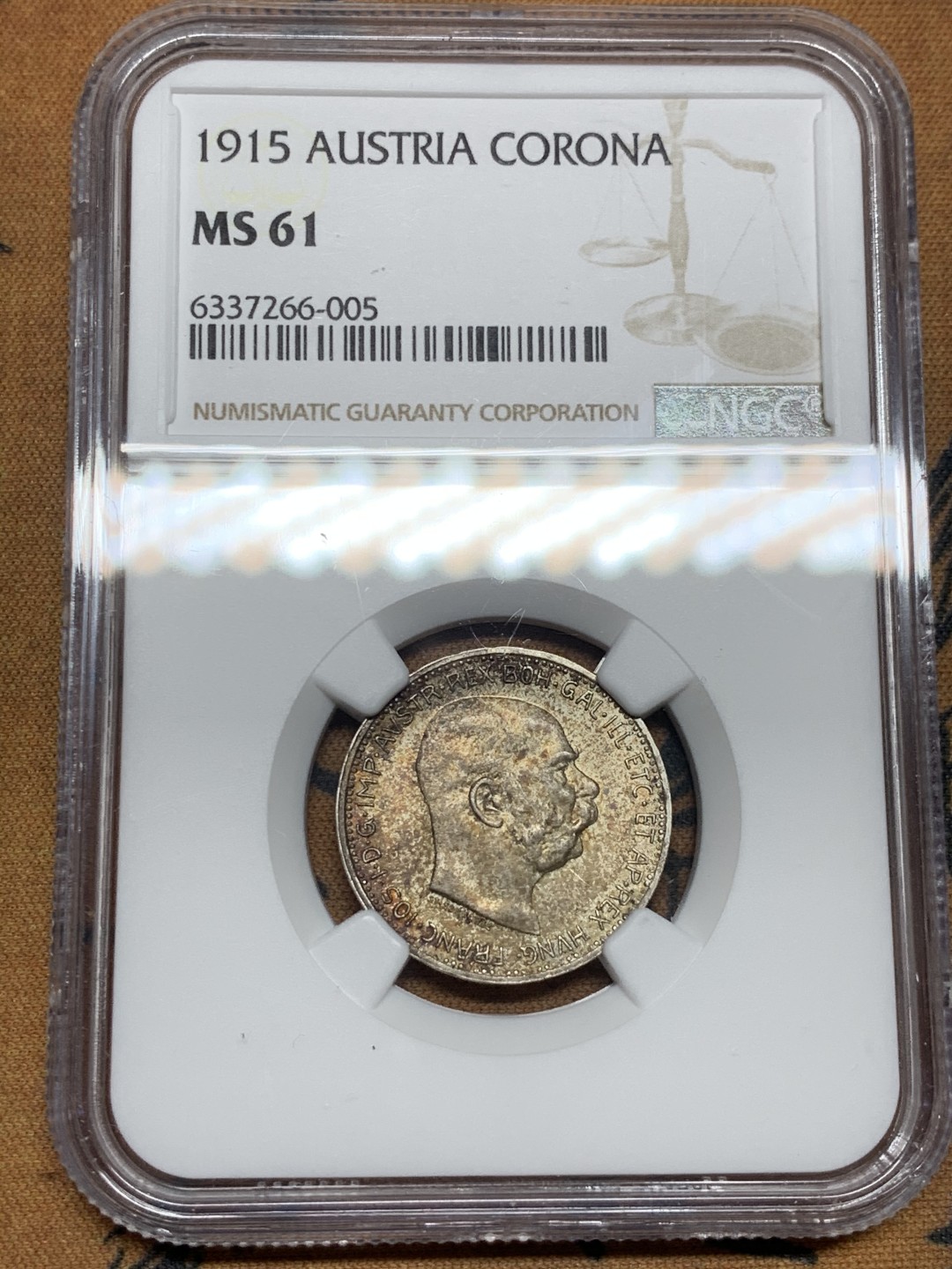 《竞宝斋》第43场-本周日，周一2场连拍（全场顺丰包邮） NGC-MS61 奥地利 1915难 佛朗茨一世 1克朗 银币 五彩包浆 很漂亮