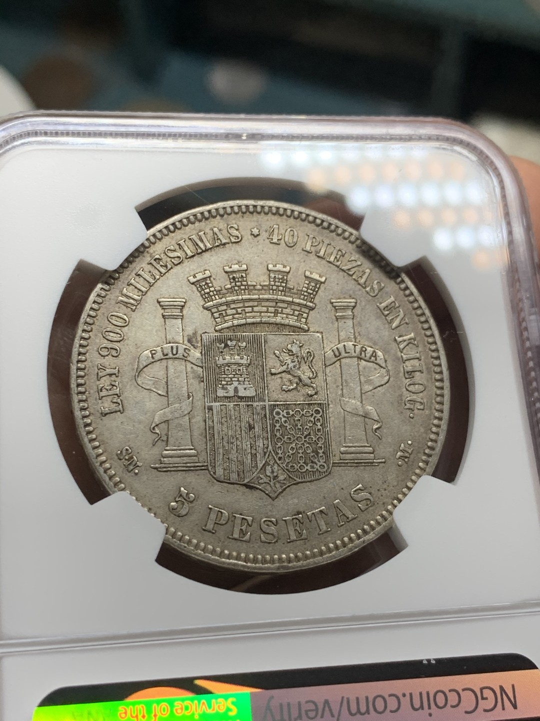 《竞宝斋》第43场-本周日，周一2场连拍（全场顺丰包邮） NGC-AU55 西班牙 1870年 坐人拿花 5比塞塔 双柱大银币 这分数已经非常非常高了