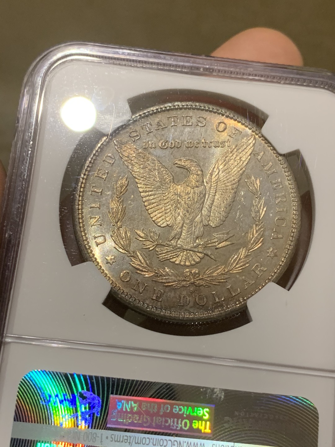 《竞宝斋》第44场-本周日，周一2场连拍（全场顺丰包邮） NGC-MS64 美国  1881年 摩根银币 原光五彩 镜面底板 非常漂亮