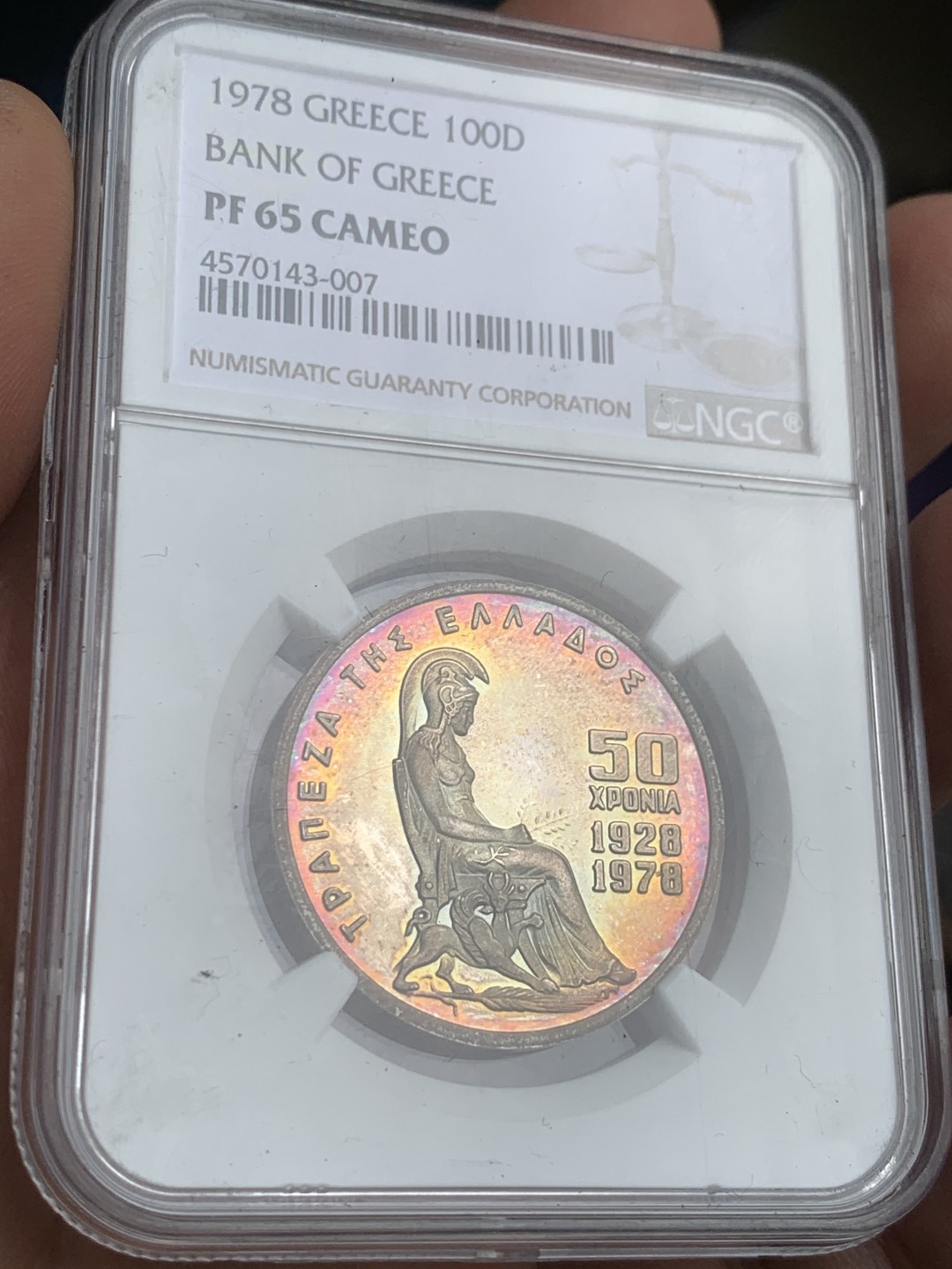 《竞宝斋》第44场-本周日，周一2场连拍（全场顺丰包邮） 1978年希腊银行成立50周年纪念雅典娜100德拉克马精制纪念银币（NGC冠军分） NGC PF65CAMEO 当紫红彩遇到cameo，实物只有俩儿字：惊艳