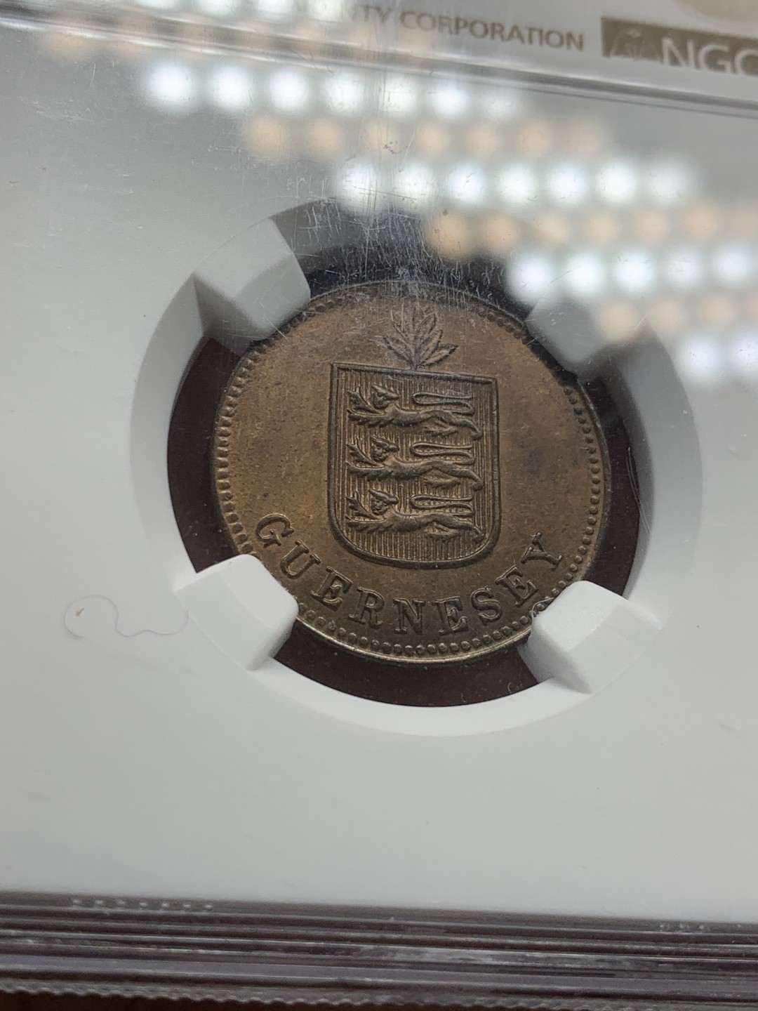 《竞宝斋》第44场-本周日，周一2场连拍（全场顺丰包邮） NGC-MS 65BN 英属格恩济1918H 2道布铜币 冠军分