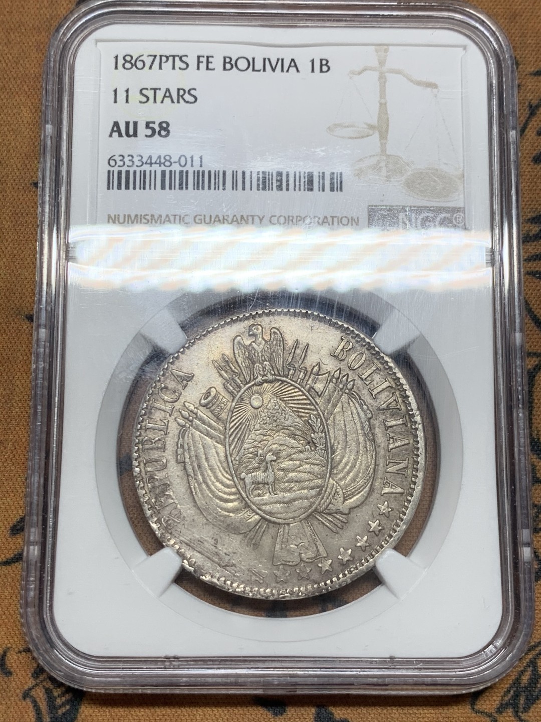 《竞宝斋》第44场-本周日，周一2场连拍（全场顺丰包邮） NGC AU58 玻利维亚 1867年 1玻利瓦 大银币 原味包浆底光十足 难得品种