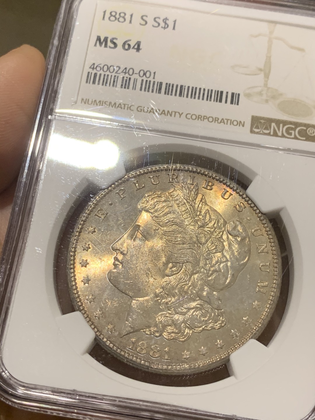 《竞宝斋》第44场-本周日，周一2场连拍（全场顺丰包邮） NGC-MS64 美国  1881年 摩根银币 原光五彩 镜面底板 非常漂亮