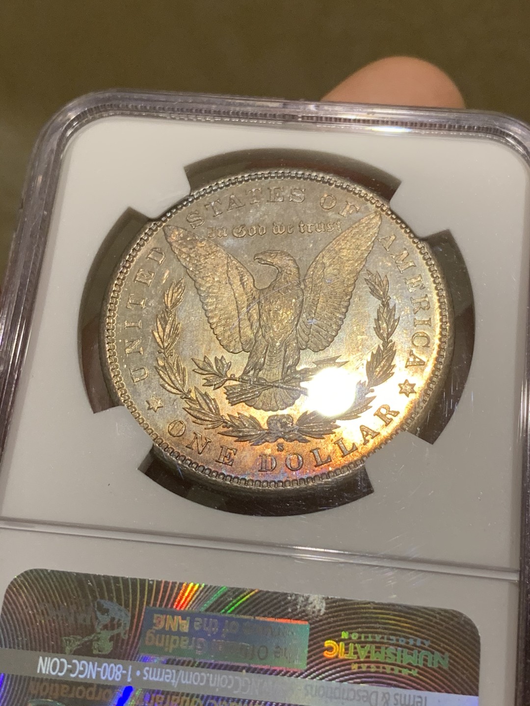 《竞宝斋》第44场-本周日，周一2场连拍（全场顺丰包邮） NGC-MS64 美国  1881年 摩根银币 原光五彩 镜面底板 非常漂亮