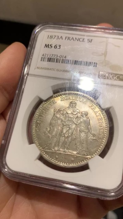 《竞宝斋》第44场-本周日，周一2场连拍（全场顺丰包邮） 1873年A版法国大力神银币 NGC MS63 分一般，状态很好