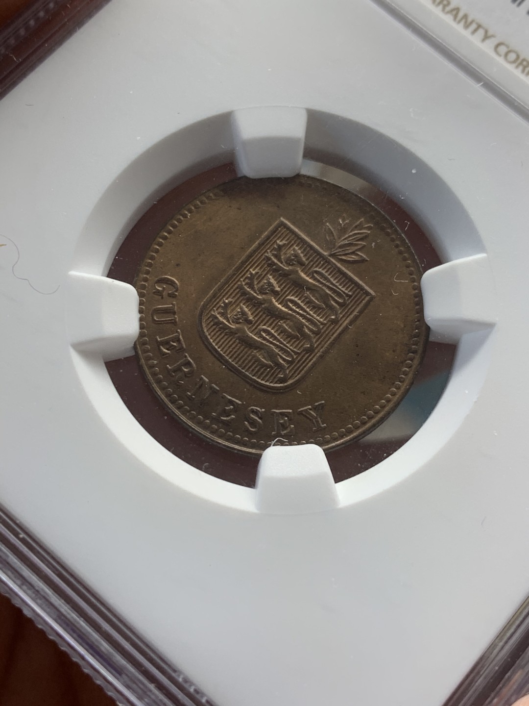 《竞宝斋》第44场-本周日，周一2场连拍（全场顺丰包邮） NGC-MS 65BN 英属格恩济1918H 2道布铜币 冠军分