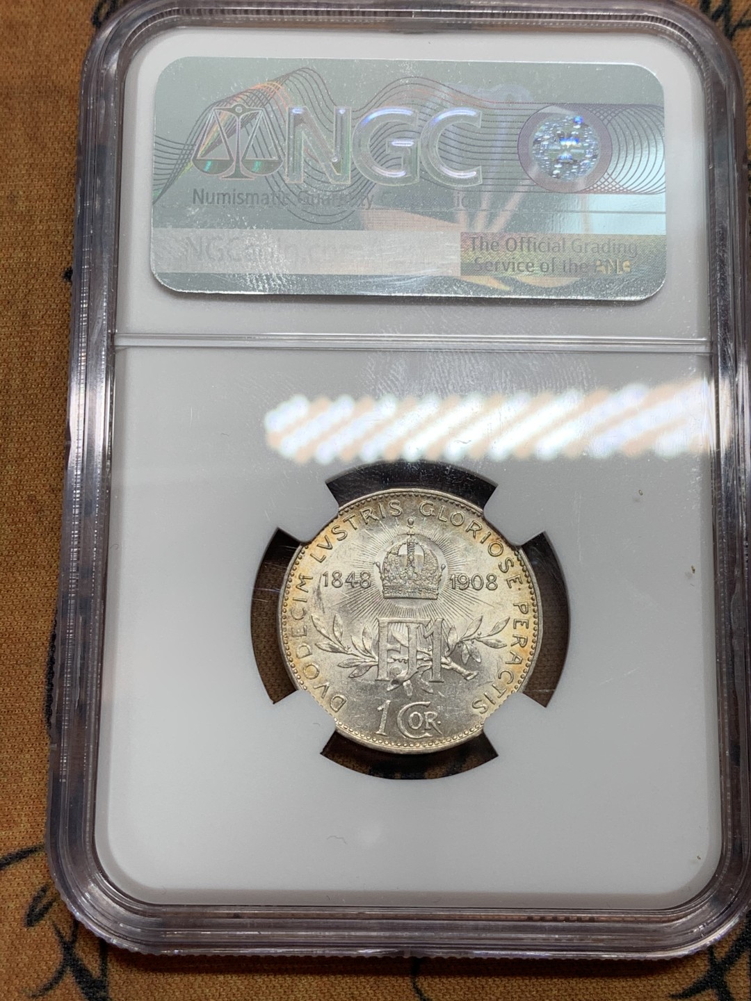 《竞宝斋》第46场-本周日，周一2场连拍（全场顺丰包邮） NGC MS63 淡彩车轮光奥地利1908年60周年建国纪念银币