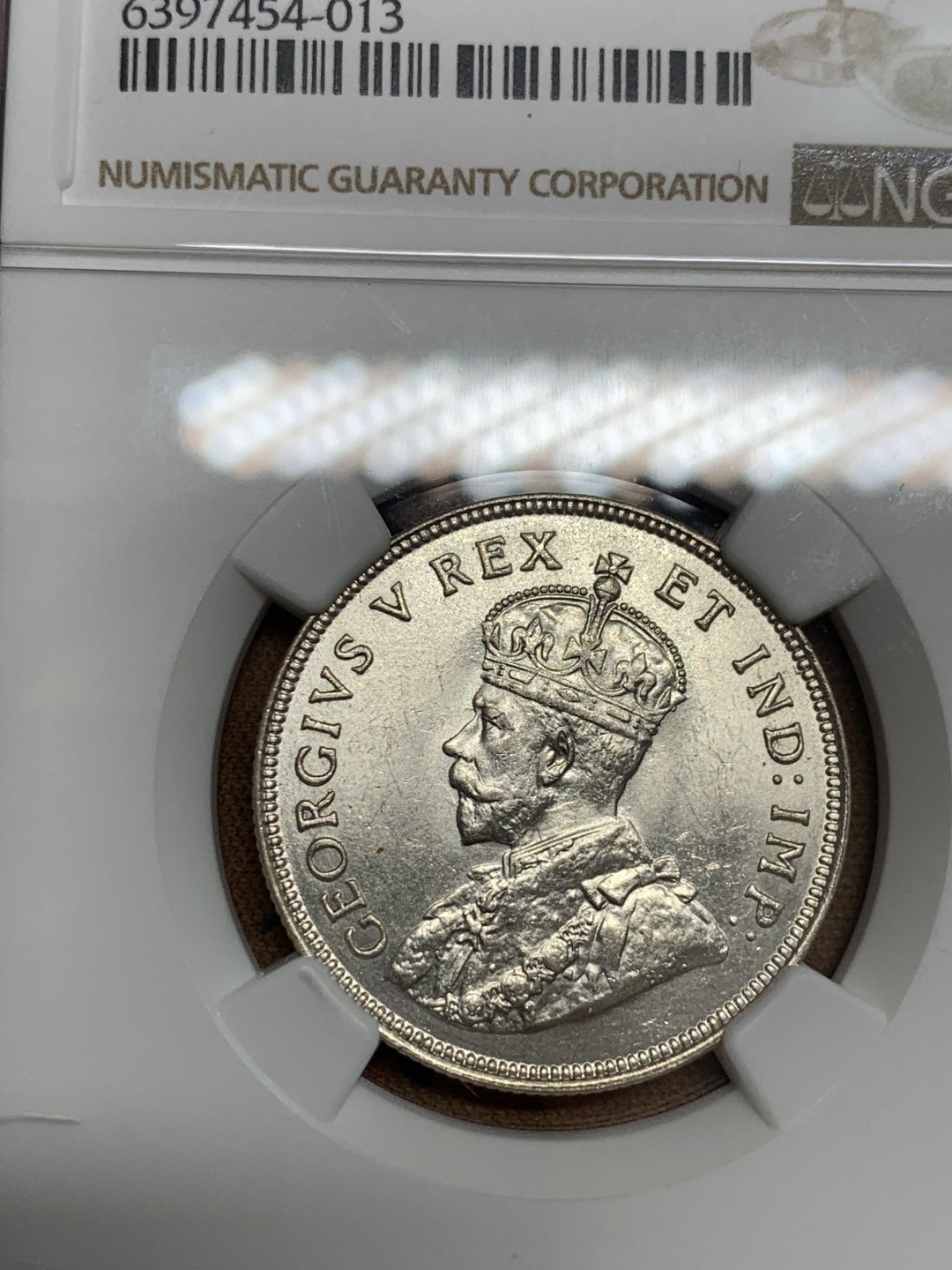 《竞宝斋》第46场-本周日，周一2场连拍（全场顺丰包邮） NGC MS63 完美原光东非1925年乔治五世1先令主币银币