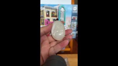 白玉俄料仿籽佛牌