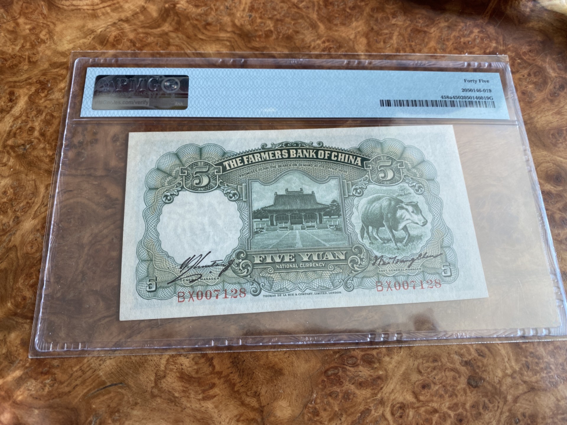Chase Auction 第6期- - 中外纸币、硬币、民国钞联拍！ 1935年中国农民银行绿5元，PMG45分，无背标，品相很好，有明显凸凹！年代久远，有些显旧，低评！该版票筋，千位号，无4尾8靓号，暴涨品种！