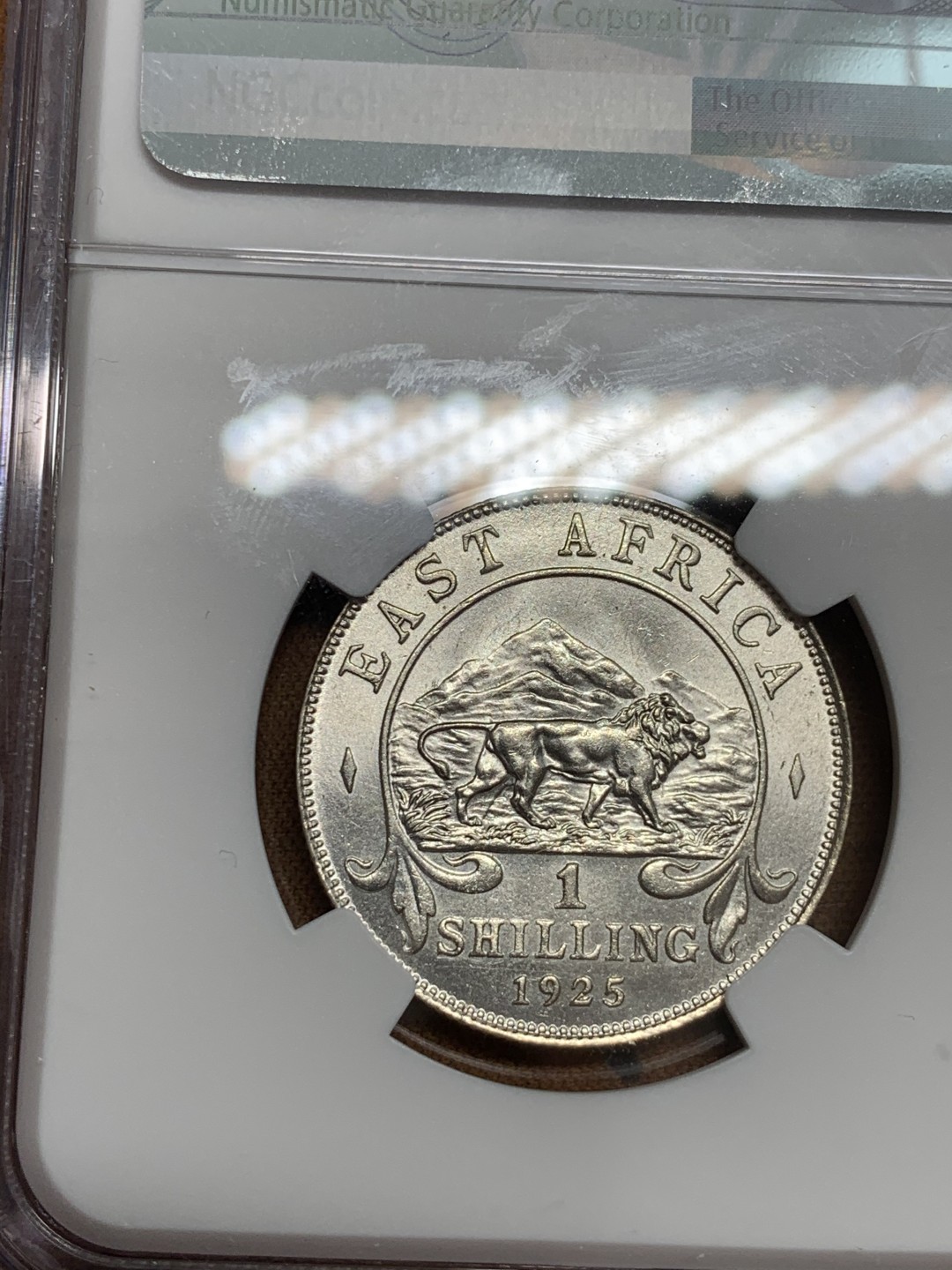 《竞宝斋》第46场-本周日，周一2场连拍（全场顺丰包邮） NGC MS63 完美原光东非1925年乔治五世1先令主币银币