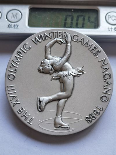 【海寧潮】拍卖第十八期 - 【海寧潮】日本1998年长野冬奥冰上舞131.38克纯银纪念章