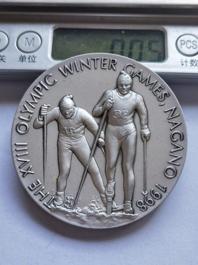 【海寧潮】拍卖第十八期 - 【海寧潮】日本1998年长野冬奥滑雪132.38克纯银纪念章