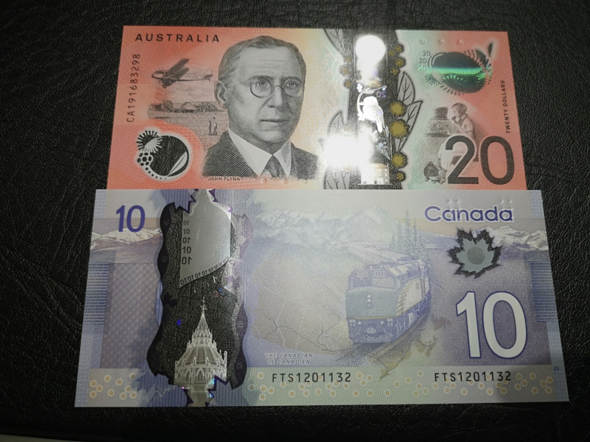 外钞收藏家》第一百七十四期拍卖 澳大利亚20、加拿大10 两张 无47 全新UNC