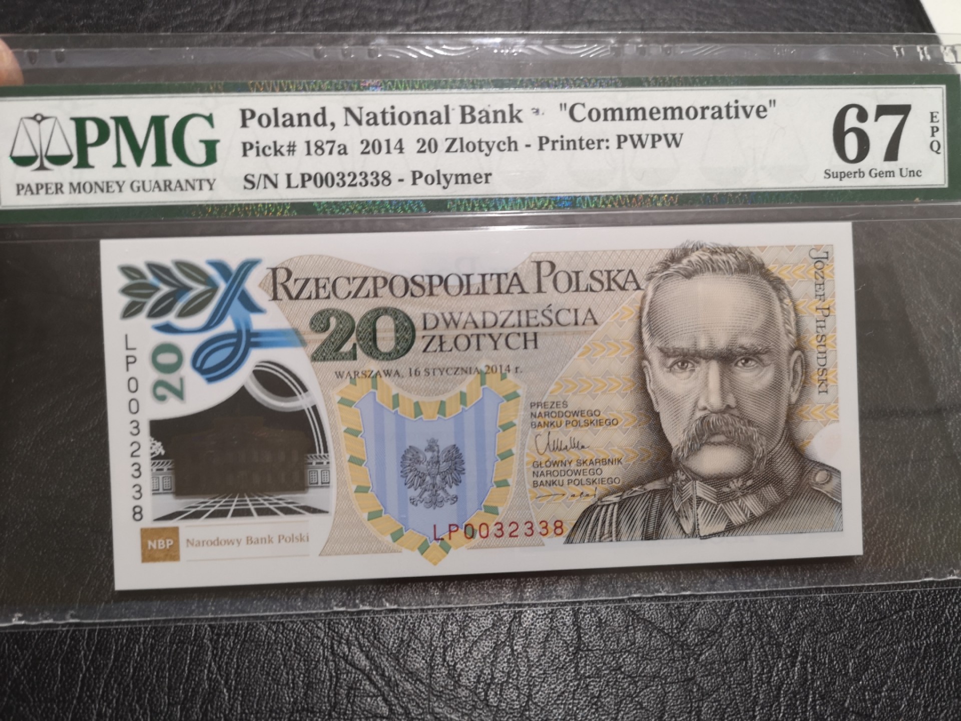 外钞收藏家》第一百七十四期拍卖 204年波兰20 PMG67 无47尾8 纪念钞