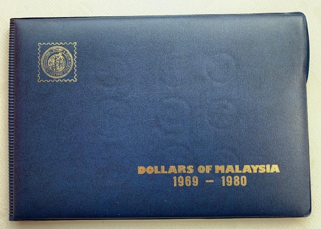 1969-1980年马来西亚一元纪念币册10枚不同全新
