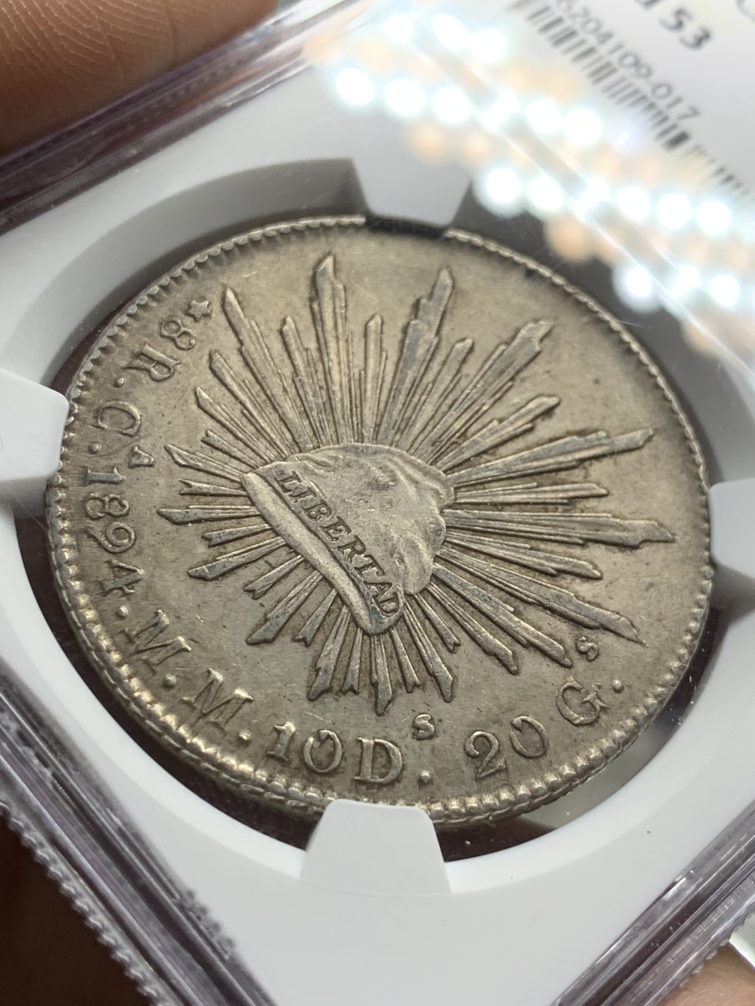 《竞宝斋》第47场-本周日，周一2场连拍（全场不限金额包邮） NGC AU53 墨西哥 1894年 CA版 花边鹰洋 原味深彩 值得收藏