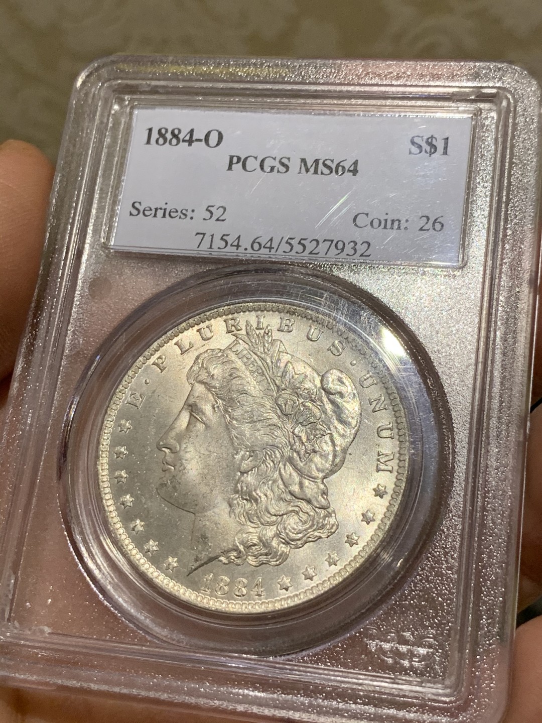《竞宝斋》第47场-本周日，周一2场连拍（全场不限金额包邮） PCGS-MS64 1884年O厂 摩根银币 鹰面金黄包浆 女神面原光 无瑕疵