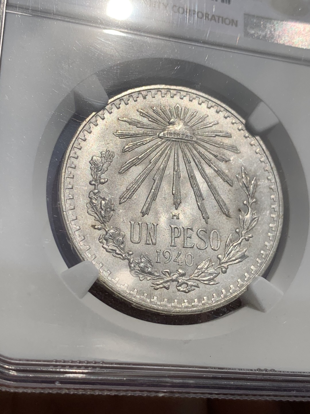 《竞宝斋》第48场-本周日，周一2场连拍（全场不限金额包邮） NGC MS66 1940M 墨西哥1比索银币 银光饱满 羽毛压印极其细腻