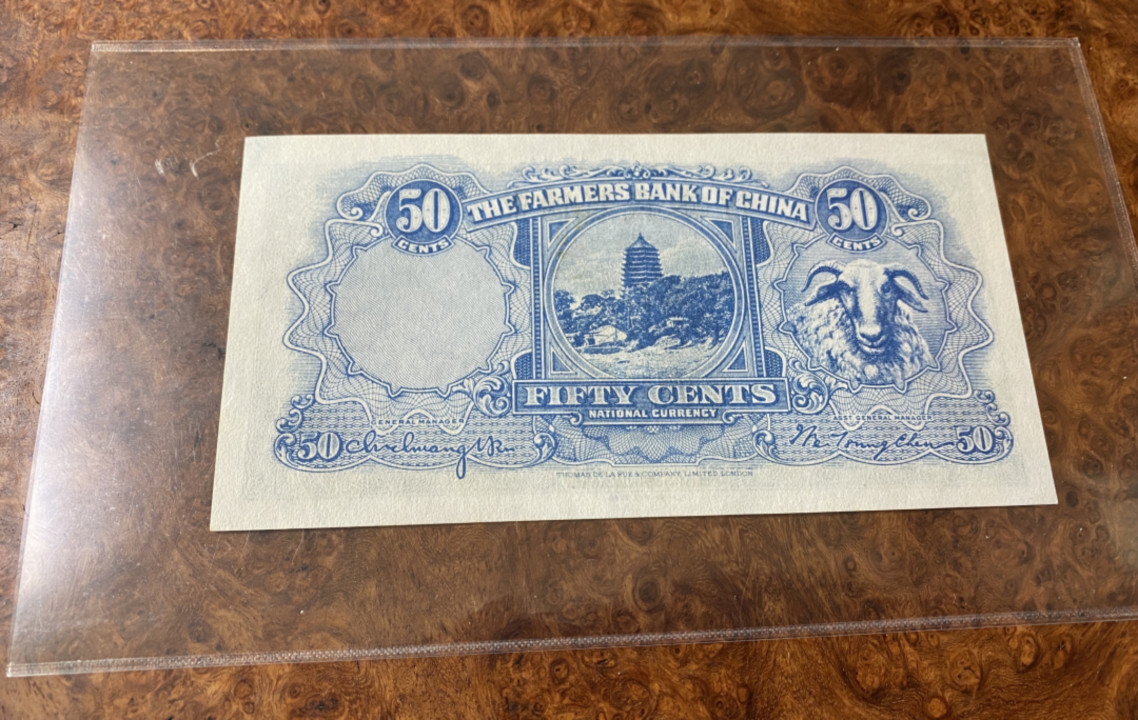 Chase Auction 第7期 - - 中外纸币、硬币、民国钞联拍！ 1936年民国二十五年农民银行5角，PMG64e剪壳！稀缺品种，品相如图，雕刻一流！此张为PMG64e剪壳！雍正耕织图，一耕！