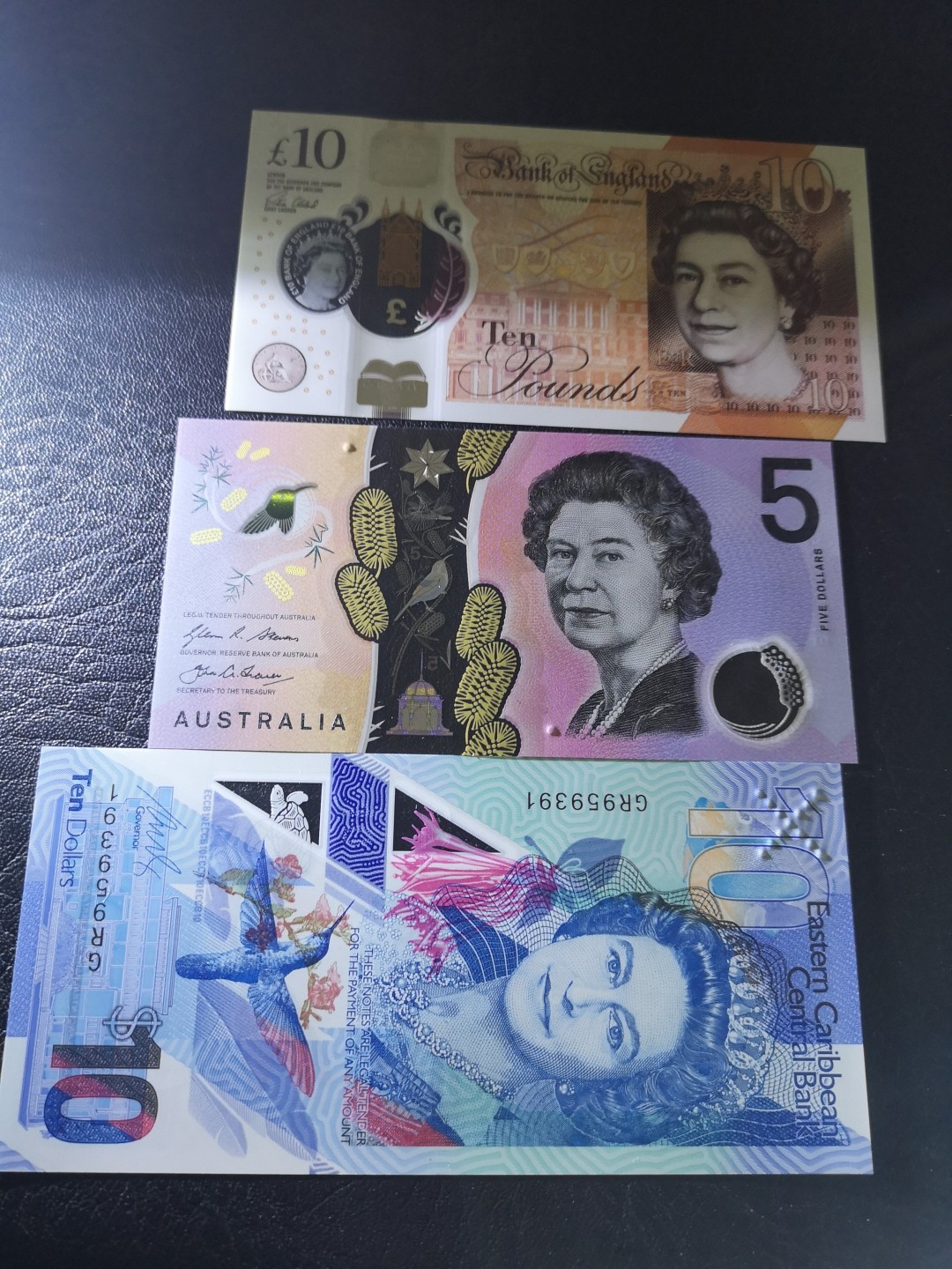 《外钞收藏家》第一百七十五期拍卖 英国、澳大利亚、东加三张塑料钞 全新UNC