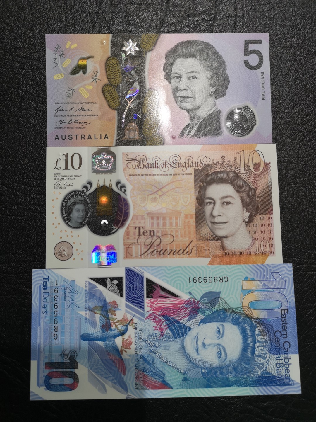 《外钞收藏家》第一百七十五期拍卖 英国、澳大利亚、东加三张塑料钞 全新UNC