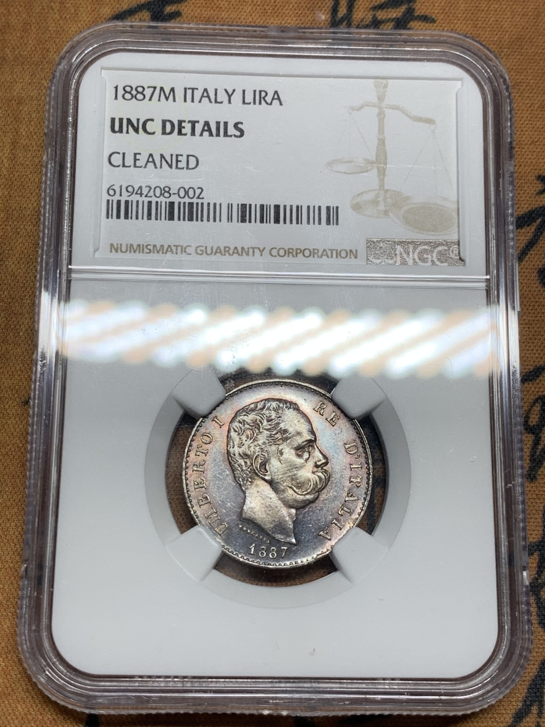《竞宝斋》第49场-本周日，周一2场连拍（全场不限金额包邮） NGC UNCD 意大利1887年1里拉银币一枚