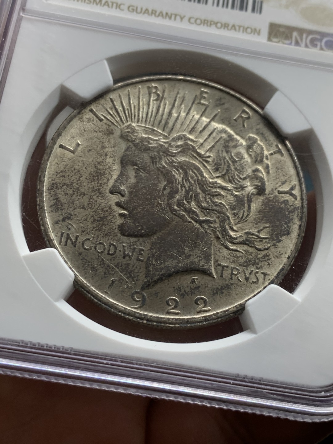《竞宝斋》第49场-本周日，周一2场连拍（全场不限金额包邮） NGC MS62 美国 1922年 和平银币 双面包浆 女神面黑包浆 双面底板光感不错