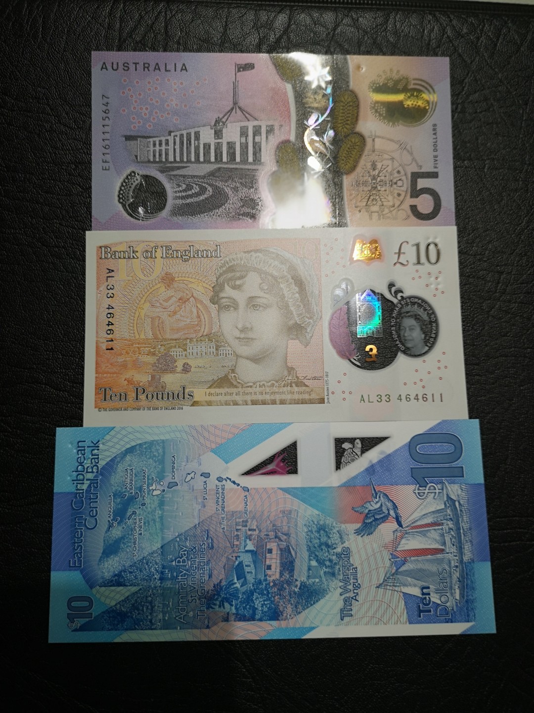 《外钞收藏家》第一百七十五期拍卖 英国、澳大利亚、东加三张塑料钞 全新UNC