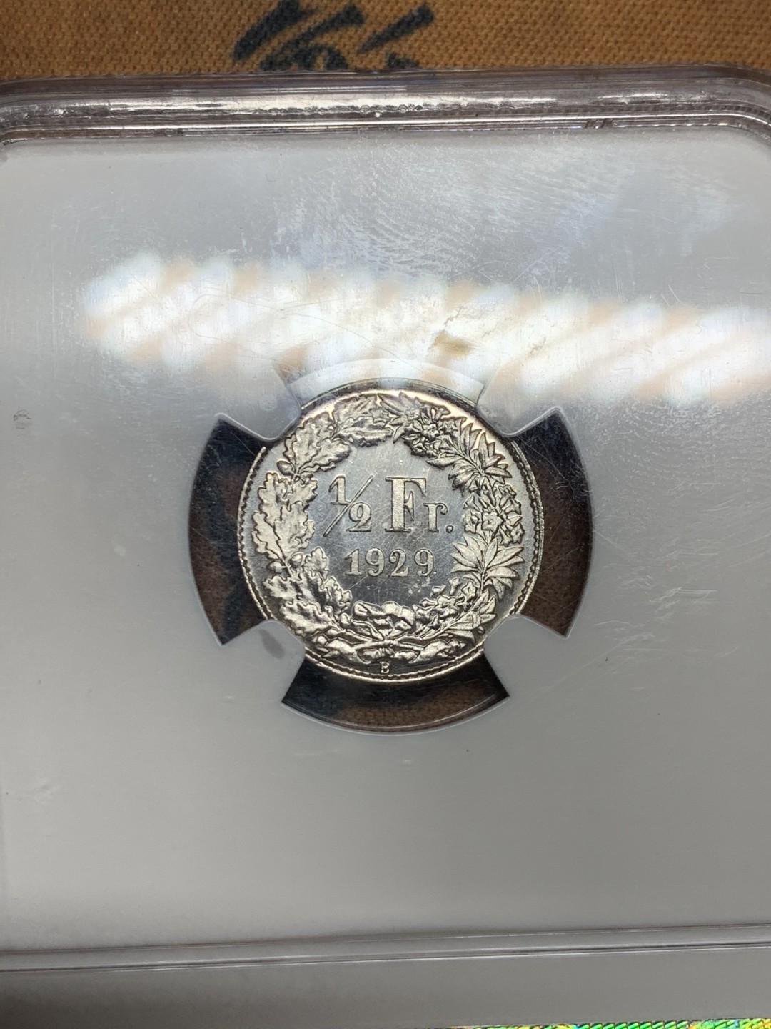《竞宝斋》第49场-本周日，周一2场连拍（全场不限金额包邮） NGC SP67 冠军分 瑞士 1929年 1/2法郎精制银币B版 早期深打、完整全镜面 N对于这种深打完整全镜面状态的 很小概率给SP 非常少见