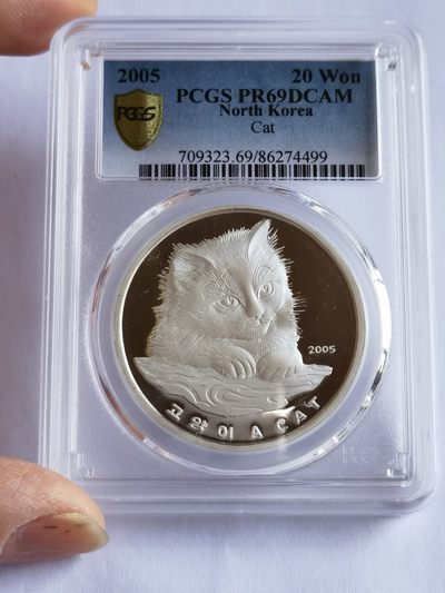 【海寧潮】拍卖第二十期 - 【海寧潮客户代拍】朝鲜2005年可爱小猫咪1盎司银币PCGC69分，冠军分