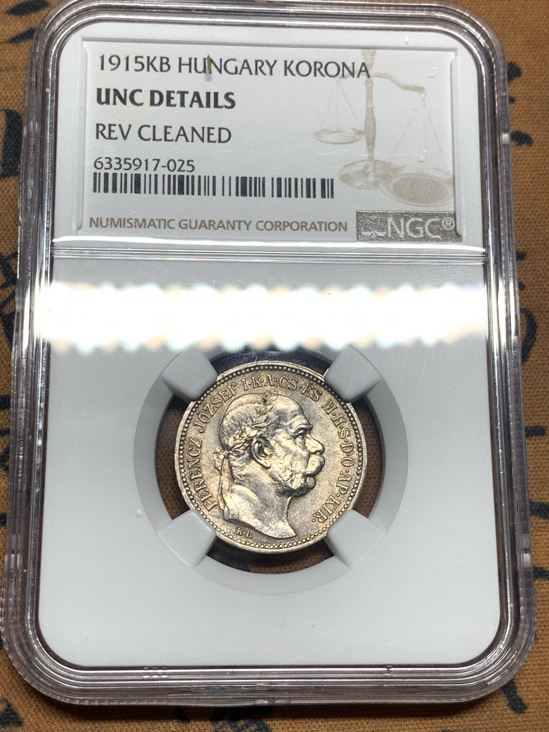 《竞宝斋》第50场-本周日，周一2场连拍（全场不限金额包邮） NGC UNC 五彩 匈牙利 1915年 1克朗 银币 背面经典的歪帽子