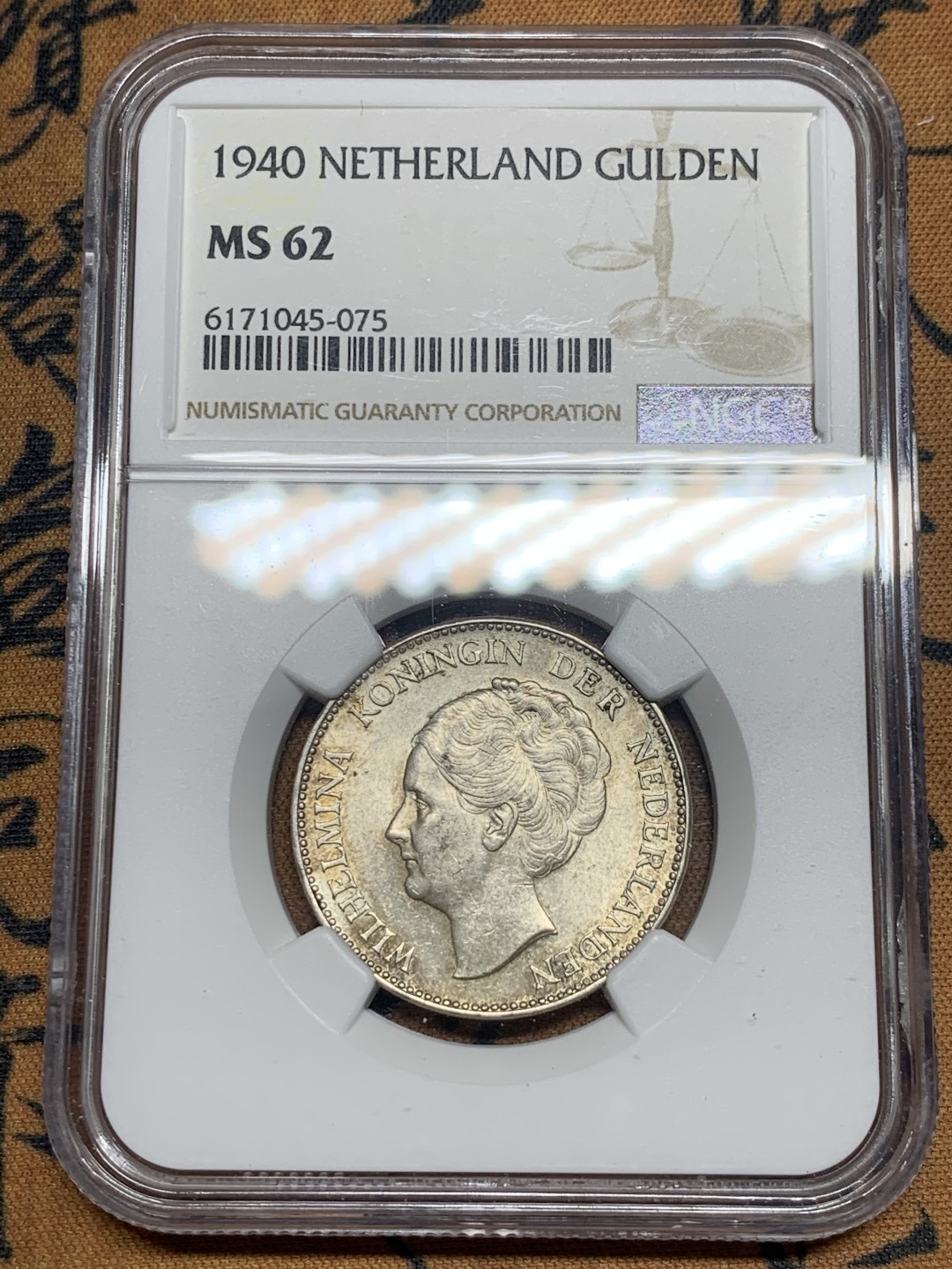 《竞宝斋》第50场-本周日，周一2场连拍（全场不限金额包邮） NGC MS62 淡彩 荷兰 1940年 1G 银币