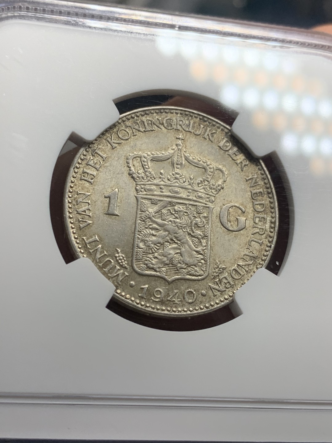 《竞宝斋》第50场-本周日，周一2场连拍（全场不限金额包邮） NGC MS62 淡彩 荷兰 1940年 1G 银币